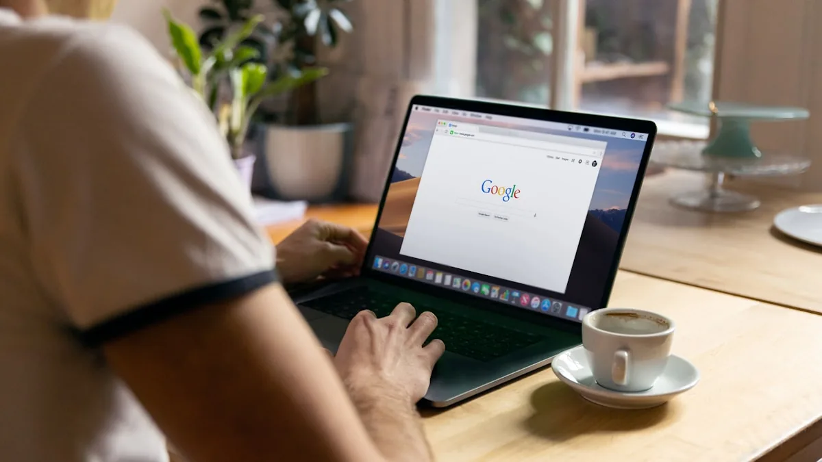 A person searching on a laptop